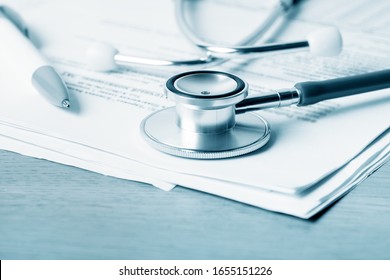 Stethoscope, Medical Documents, Insurance Concept.