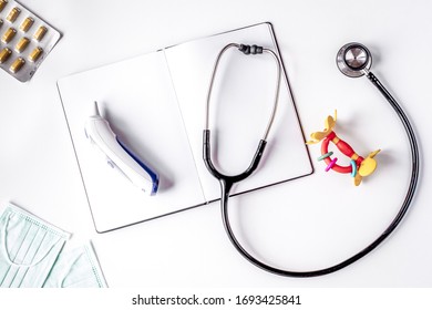 Stethoscope, Notebook On Children's Doctor Office Desk Background Top View Mockup