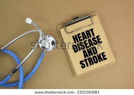 stethoscope and a notebook with the words Heart disease and stroke. health and medical concepts