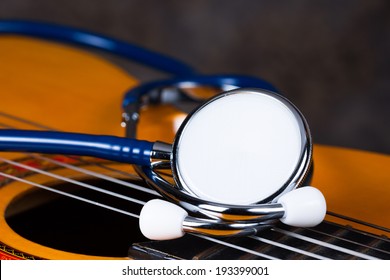 Stethoscope On Classical Guitar , Music Therapy