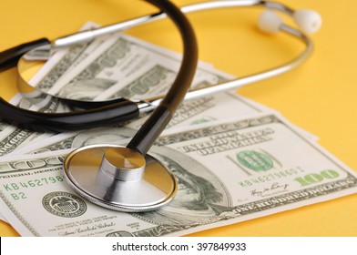 Stethoscope on Dollar, Medical Care Cost Concept