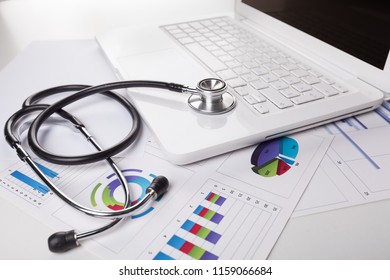 Stethoscope on laptop computer