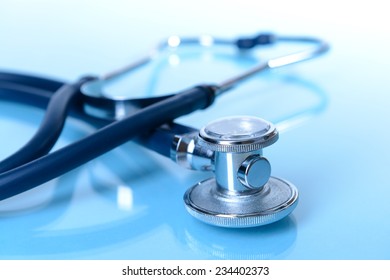 Stethoscope On Light Blue Background Stock Photo (Edit Now) 227351179