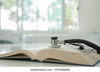 stethoscope on medical guide book for doctor learning treatment at hospital.  medical education learning concept. - Powered by Shutterstock