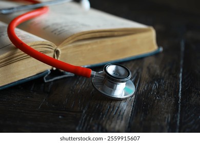 Stethoscope on Open Book - Symbol of Healthcare and Medical Education - Powered by Shutterstock