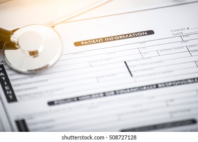 Stethoscope On Patient Form On The Desk.