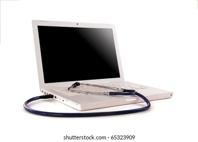 Stethoscope on silver laptop computer