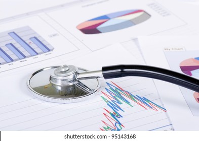 Stethoscope on stock chart - market analysis - Powered by Shutterstock