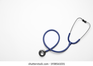 Stethoscope on white background, top view. Space for text - Shutterstock ID 1938561031