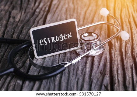 Stethoscope on wood with estrogen word as medical concept [[stock_photo]] © 