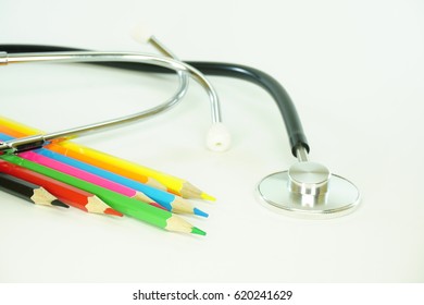 Stethoscope with pencil colors as symbolic awareness  - Powered by Shutterstock