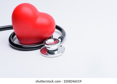 stethoscope and Red heart  on white background - Shutterstock ID 1058246519