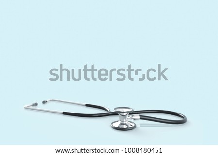 Stethoscope with reflection on glossy background. stethoscope on gray blue tone. Background with space for copy.