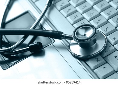 Stethoscope Resting On A Computer Keyboard