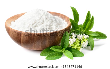 stevia sugar in the wooden bowl, with fresh stevia leaves and flowers, isolated on white background