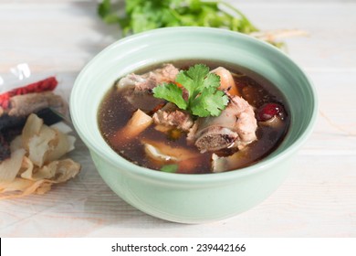 stew of pork and herbal soup, ba kut teh on wood table 