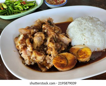 Stewed Leg Pork With Sweet Gravy Sauce On Rice. Pork Knuckle,Chinese Style Food.