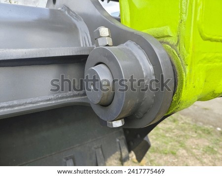 The stick arm linkage of an excavator that is driven by hydraulic cylinder to move the bucket