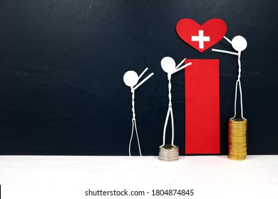 Stick figure reaching for a red heart shape with cross cutout while stepping on stack of coins. Healthcare and medical care access inequality concept.