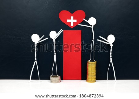 Stick figure reaching for a red heart shape with cross cutout while stepping on stack of coins. Health care and hospital access inequity and disparity concept.