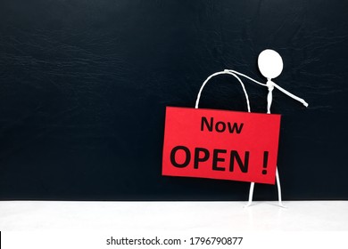 Stick Man Figure Holding A Now Open Red Signage. Business And Shop Opening Concept.