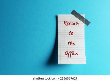 Stick Note On Blue Copy Space Background Wuith Handwritten RETURN TO OFFICE, Concept Of Employers Recalling Employees Back To Workplace After Pandemic Working From Home