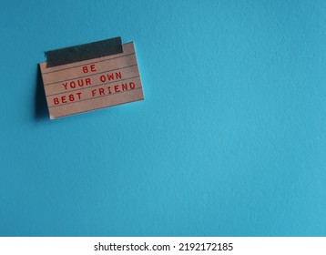 Stick Note On Blue Copy Space Background With Handwritten Text BE YOUR OWN BEST FRIEND, Means To Be Kind To Yourself, The Only Friend To Have For Life, Guide Yourself To Greatness With Self-compassion