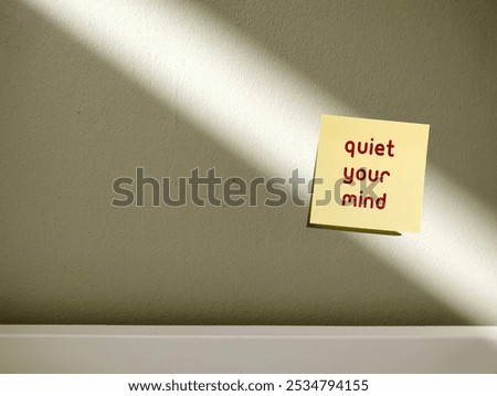 Stick note on copy space background with text written Quiet Your Mind - to stop overthinking or repetitive negative thinking - unwanted cognitive activity of rumination and worry