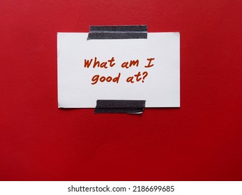 Stick Note On Red Background With Handwritten Text WHAT AM I GOOD AT? Question To Find Out Who You Are, Reveals True Passion Which Could Be Your Expertise And What You Should Do