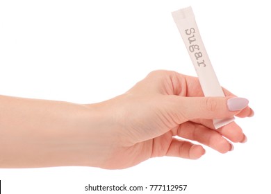 Stick of white sugar female hand isolated on white background isolation