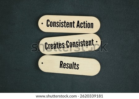 Stick with the words Consistent Action Creates Consistent Results text. Success concept 