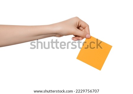 Sticker or sticky post-it notes in hand, isolated.