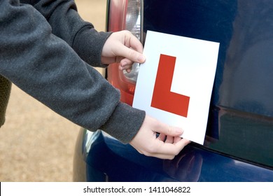 Sticking a Leaner Driver 'L' sign at the rear of a car