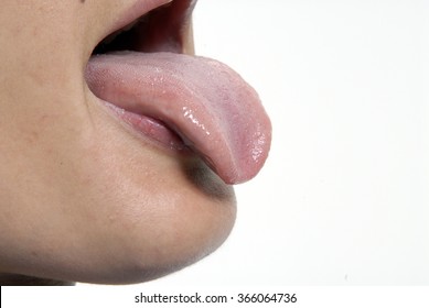 Sticking out tongue detail on white background. - Shutterstock ID 366064736