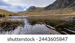 Stickle Tarn: a serene and tranquil example of natural beauty in a glacial landscape 