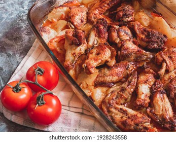 Sticky BBQ Chicken Wings On A Baking Sheet