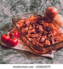 Sticky BBQ Chicken Wings On A Baking Sheet