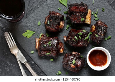 STICKY BEEF SHORT RIBS. Sweet BBQ . Flatlay. Top View