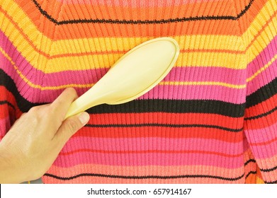  Sticky Brush In Hand Cleaning Hair And Dust On Colorful Sweater