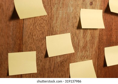 Sticky Memo Post Its On Wooden Background