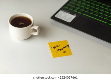 Sticky Note "Good Morning" and Computer Keyboard With Coffee, Smart Phone,  And Office Supply on White Background - Powered by Shutterstock