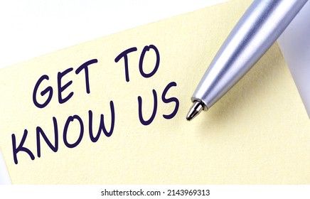 Sticky Note Message GET TO KNOW US With Pen On A White Background