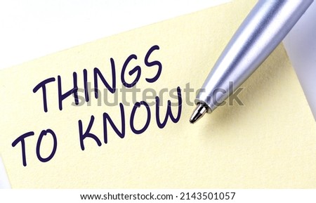 Sticky Note Message THING TO KNOW with pen on a white background