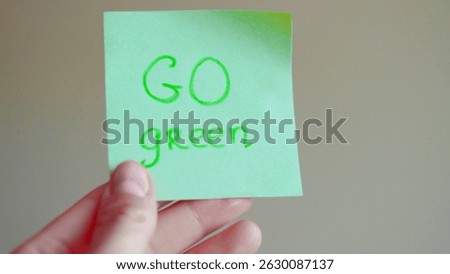 Sticky note reminders on kitchen fridge promoting healthy eating and wellness.