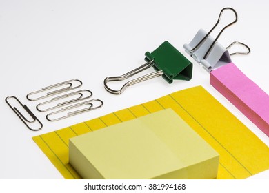 Sticky notes and binder clips