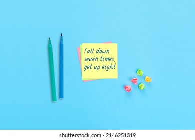 Sticky Notes With Handwritten Text Fall Down Seven Times Get Up Eight. Motivational Statement.