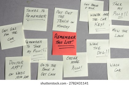 Sticky notes are placed on a wall with various reminders written on them. The notes include tasks for the day and important things to remember. Some notes are colorful, and one is larger.