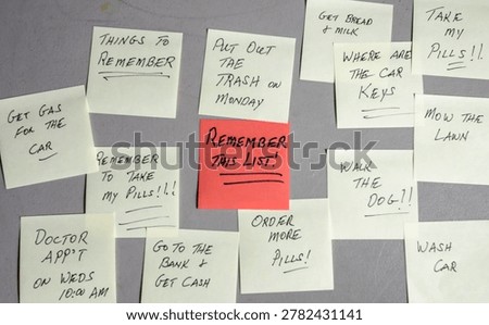 Sticky notes are placed on a wall with various reminders written on them. The notes include tasks for the day and important things to remember. Some notes are colorful, and one is larger.