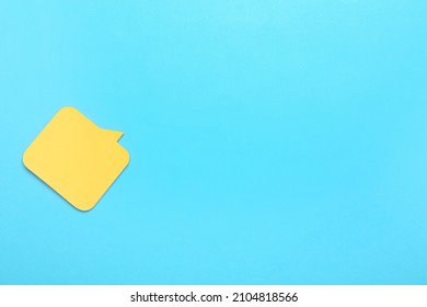 Sticky notes in shape of speech bubble on color background