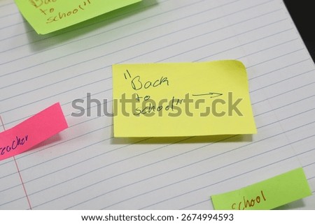 sticky notes stuck to a school notebook written on them student teacher school homework